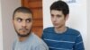 Armenia -- Opposition activists Davit Kiramijian (L) and Sargis Gevorgian at the start of their trial in Yerevan, 14July 2010.