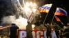 21 februarie 2022. Activiști pro-ruși în Donețk, celebrând „independența” decretată de Putin