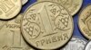 Списання 20% боргу позитивно вплине на гривню – економісти