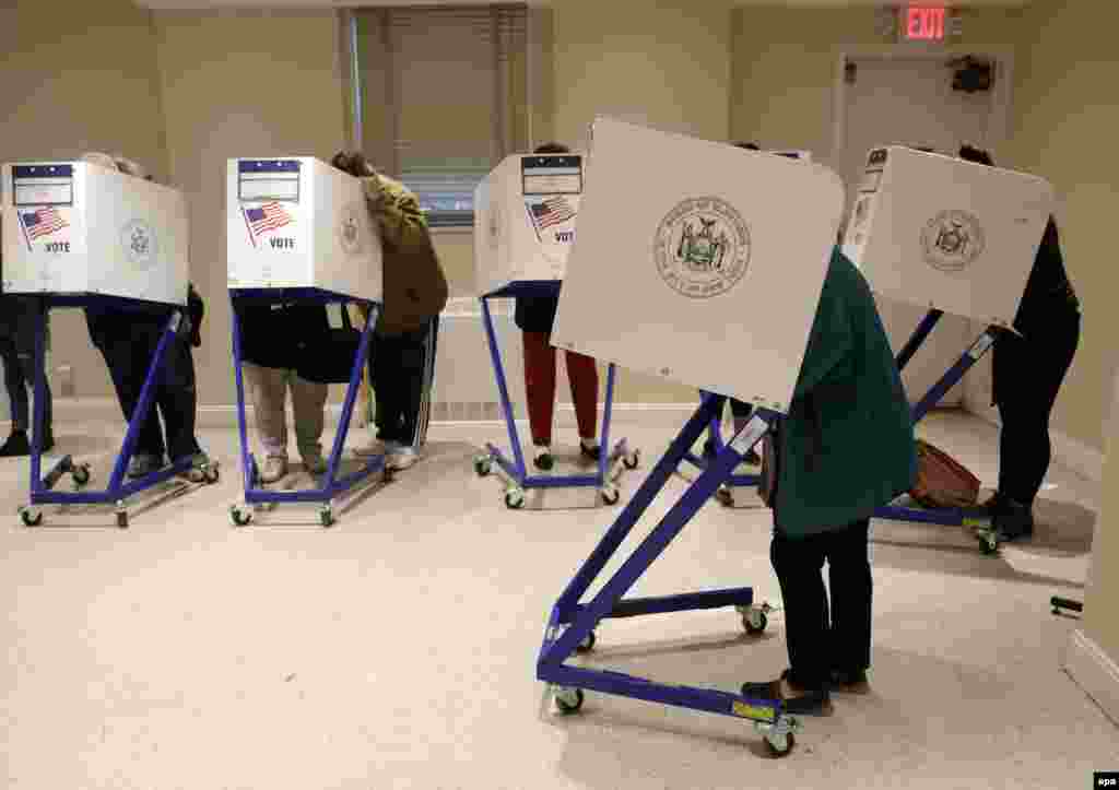 Voters fill out their ballots on the Lower East Side of Manhattan, New York.