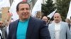 Armenia - Businessman Gagik Tsarukian and his chief bodyguard Eduard Babayan (R) at an election campaign rally in Hrazdan, 11 April 2012.