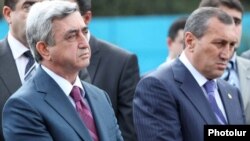 Armenia - President Serzh Sarkisian (L) and Surik Khachatrian, governor of Syunik province, attend an official ceremony.