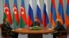 Russia - President Dmitry Medvedev (C) meets with his Armenian and Azerbaijani counterparts.
