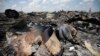 The downing of Malaysia Airlines Flight MH17 in eastern Ukraine was a tragedy, but was it a war crime?
