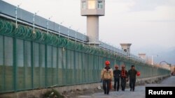 BMG Hytaýyň “terrorçylyga garşy merkezlerinde” milliona golaý şinjiangly musulmanyň saklanýandygyny aýtdy. Arhiw suraty