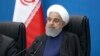 Iranian President Hassan Rohani attends a meeting in the southwestern city of Ahvaz while touring Khuzestan Province on March 29