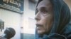 A television shot of Esfandiari in front of Evin prison after her release