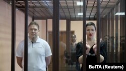 Maria Kolesnikova și Maksim Znak au fost acuzați de extremism și de tentativă de preluare ilegală a puterii. Minsk, 6 septmebrie 2021. Sursa: Ramil Nasibulin via REUTERS