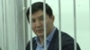 Бывший депутат парламента Кыргызстана Дамирбек Асылбек уулу в суде в Алматы. 2 ноября 2018 года.