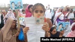 Thousands of women, children, and men held up photos, placards, or the natoinal ID cards of their missing family members.