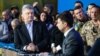 Тодішні кандидати на посаду президента України Петро Порошенко і Володимир Зеленський (праворуч) під час дебатів на стадіоні «Олімпійський». Київ, 19 квітня 2019 року