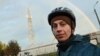 Польський волонтер Кацпер Сєніцький під час благодійного велопробігу. Польща, околиці Любліна, жовтень 2024