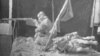 Репродукция со скульптуры Лебедева «Повстанцы. 1916 год».